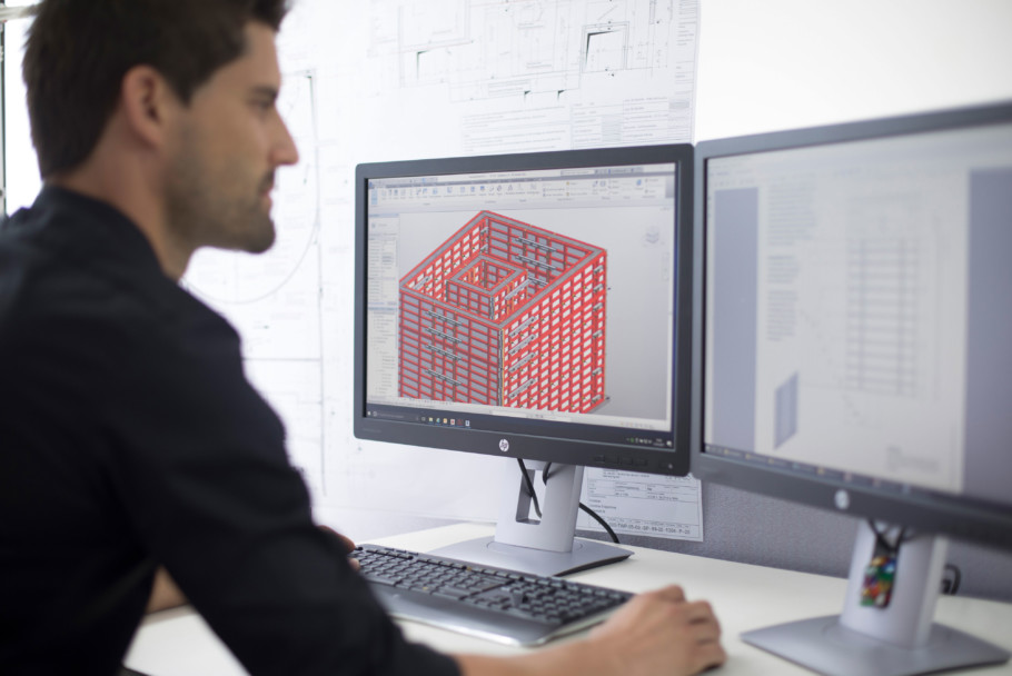 A formwork engineer working on CAD