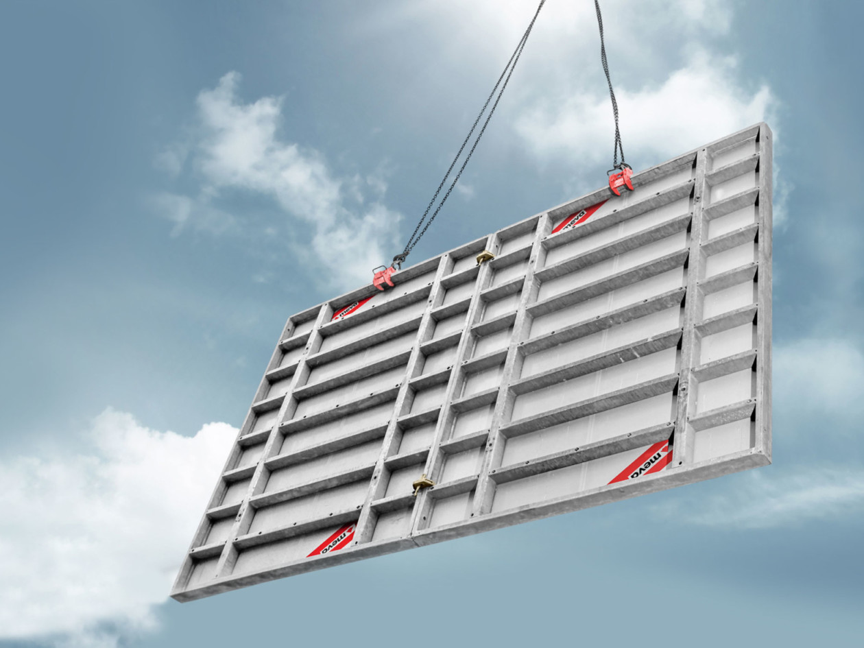 Wall formwork being lifted by a crane