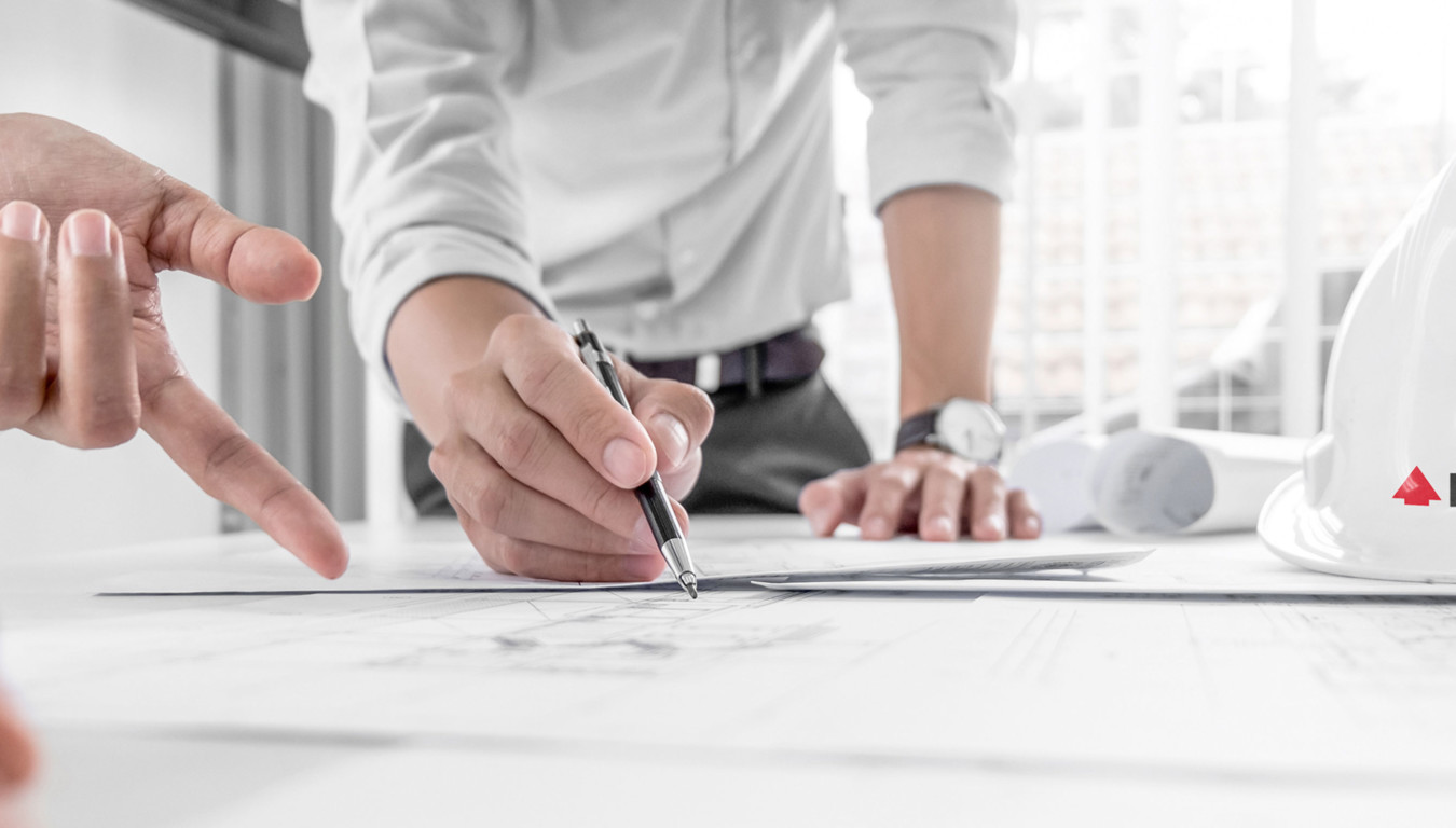 Two people discussing formwork plans
