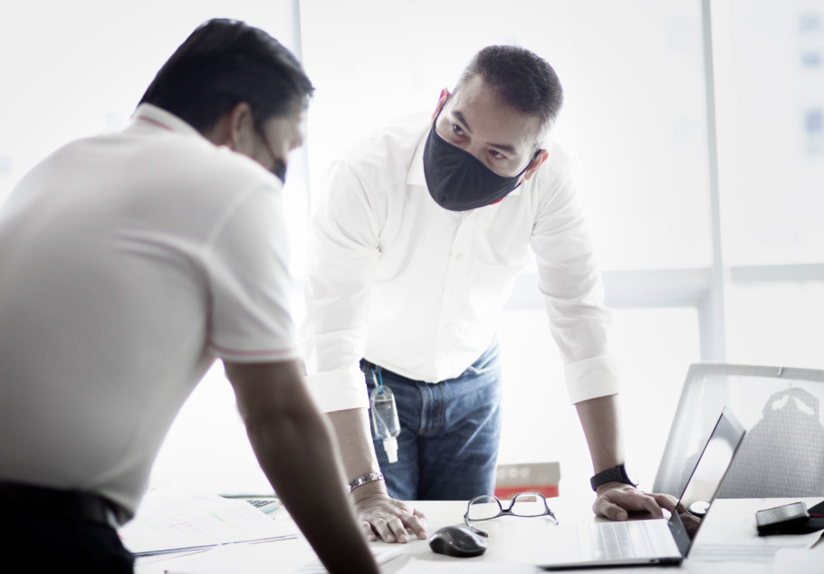 Two people discussing formwork design