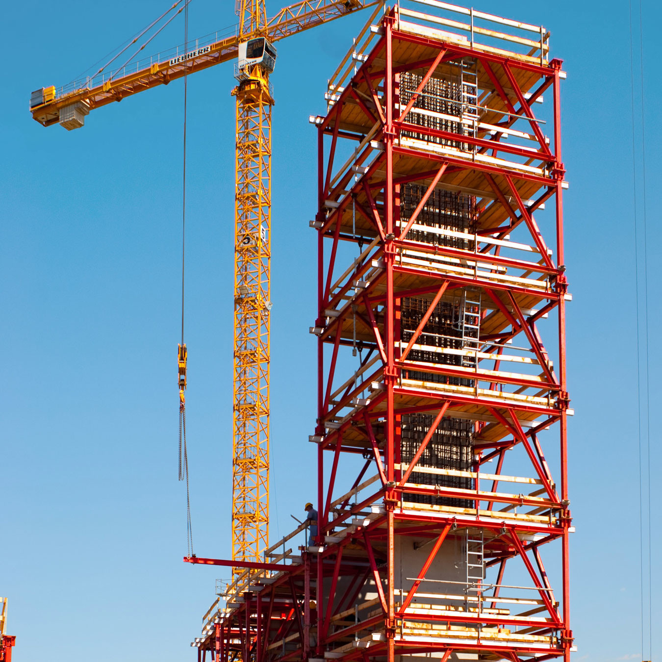 Shoring tower to support concrete tower construction