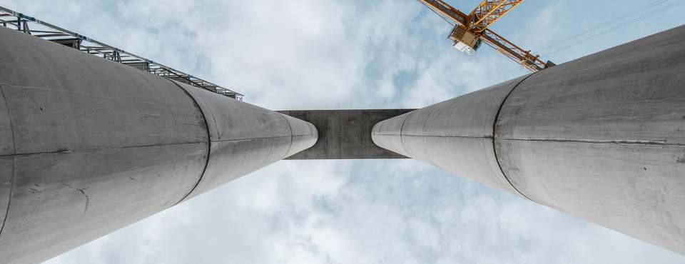 Looking up at concrete columns which have been constructed using MEVA's column formwork system