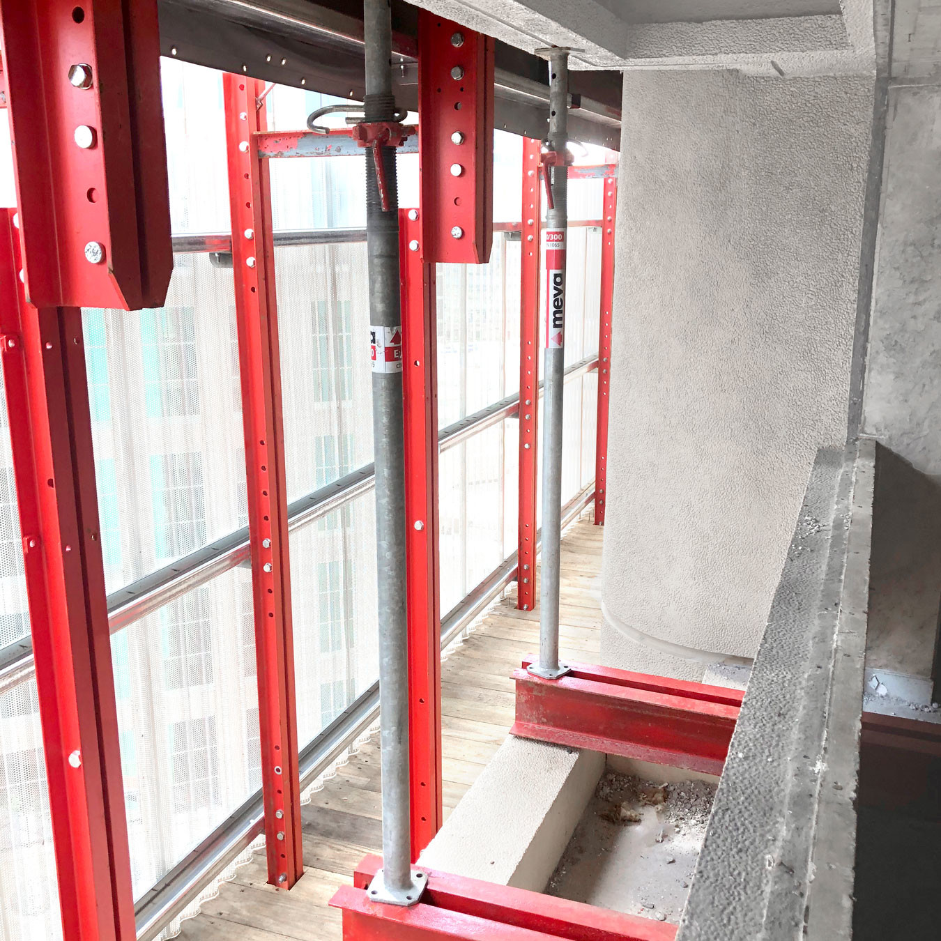 Detail of a rail guided screen system to protect workers