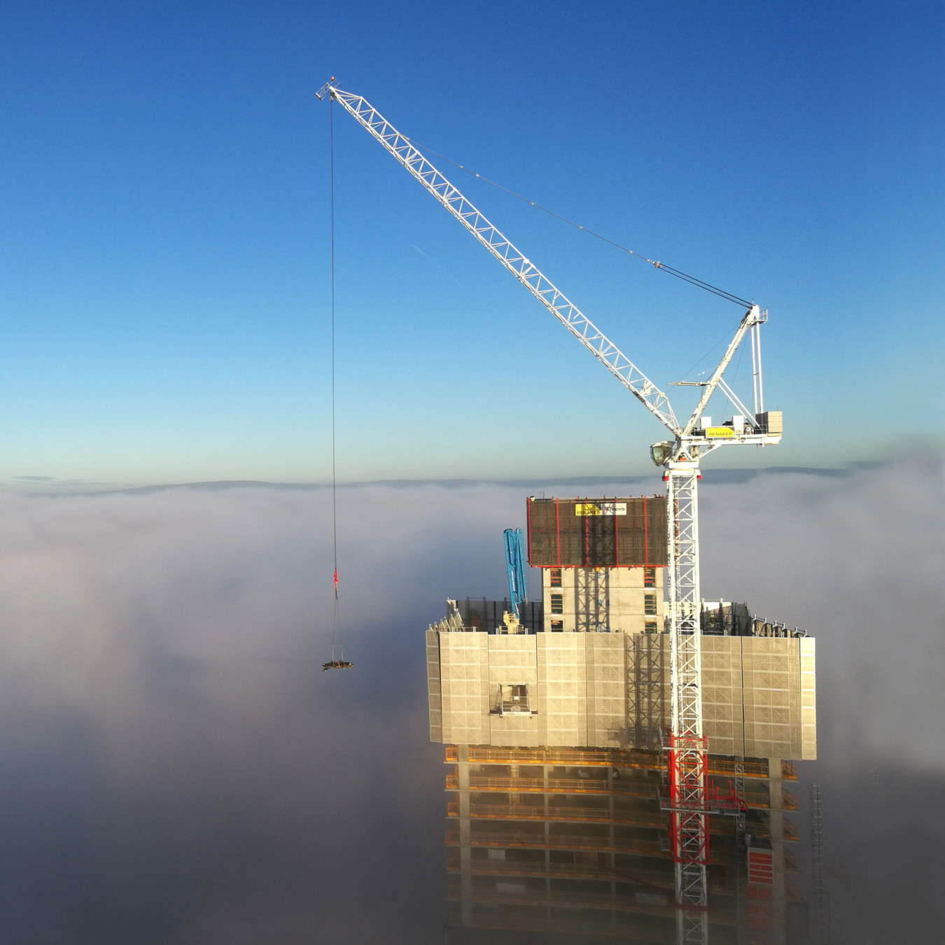 High rise building through the clouds in Manchester