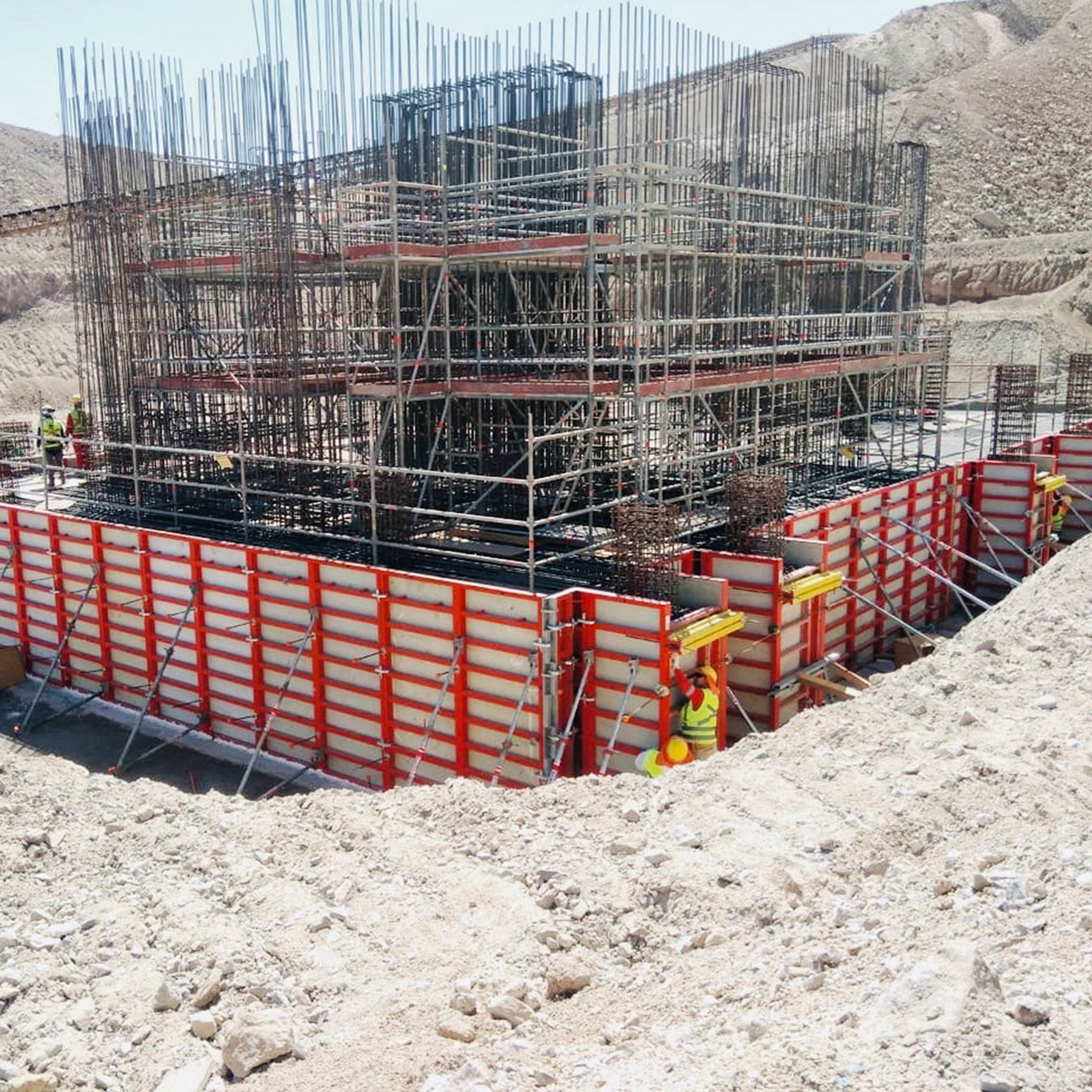 Steelwork and wall formwork being set up on site