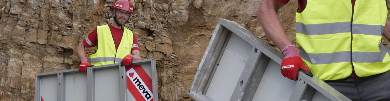 Construction worker with handset formwork